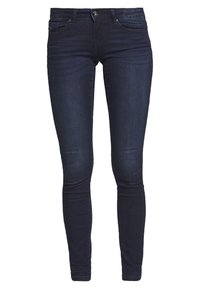 Jeans skinny de denim azul oscuro con un ajuste slim, que cuentan con cierre de cremallera y botón en la parte delantera, y cinco bolsillos. Textura suave con un leve desgaste.