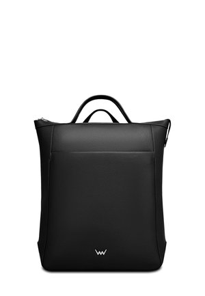 Black leather backpack with a textured surface, rectangular shape, top handle, and a front pocket. Features subtle logo detail at the bottom.