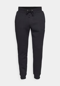 CENTRE TAPERED SWEATPANTS - Trainingsbroek - black beauty