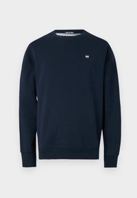 Sweat-shirt à col rond bleu marine à manches longues avec une petite étiquette logo rectangulaire sur la poitrine gauche.