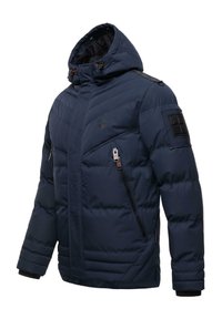 Marinblå puffjacka med huva, med dragkedjestängning, dragkedjefickor på sidorna och texturerade detaljer på axlarna och ärmarna.