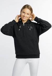 Zwarte zip-up hoodie van dikke stof met een kangoeroezak, verstelbare trekkoorden en een klein logo op de borst.