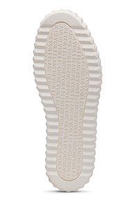 White rubber sneaker sole with deep ridges, featuring repeated embossed text “blanche voile” throughout. Textured surface for traction.