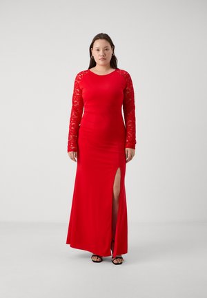 Red long-sleeve dress with lace sleeves, fitted silhouette, and a side slit. Smooth fabric with a solid color throughout.