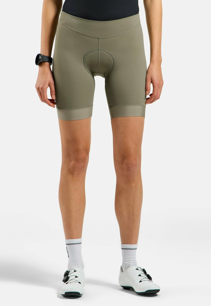 Korte fietsbroeken in olijfgroen, met een gevoerd inzetstuk, een elastische tailleband en geperforeerde accenten aan de zoom.