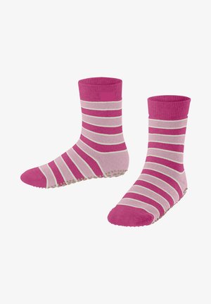 Rosa geringelte Socken mit einem gerippten Bund, weicher Textur und einer rutschfesten Sohle, die mit kleinen, runden Noppen für besseren Halt verziert ist.