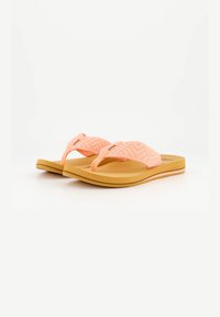 Pink flip flops with textured straps, featuring a geometric pattern. The sole is yellow with a slight curve and pink accent.