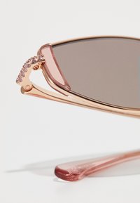 Swarovski Napszemüvegek - rose gold-coloured