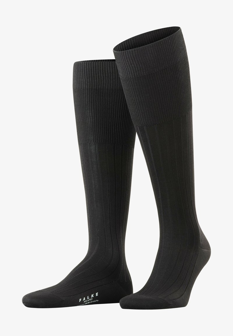 Calze nere al ginocchio con texture a coste, punta rinforzata e branding discreto sulla suola. Realizzate in un materiale morbido e elasticizzato.