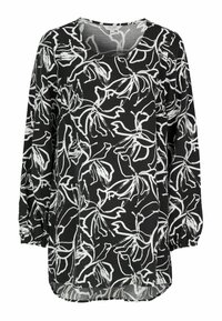 Svart långärmad blus med vit blommig dekor, med rundad halsringning, volangärmar och en lätt böjd nederkant.