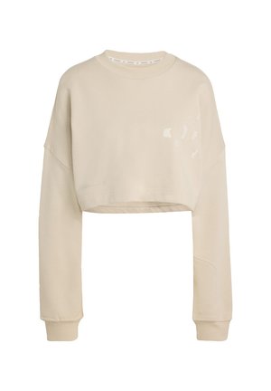Afkortet beige sweatshirt med lange ærmer, ribbet halsudskæring og et tekstureret mønster foran. Har et diskret logo ved kanten.