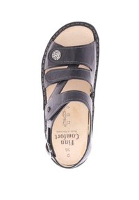 Sandal a rete nera in pelle con due cinturini regolabili, design aperto sulla punta e soletta imbottita. Presenta un logo impresso e dettagli in cucitura. Taglia 36D.