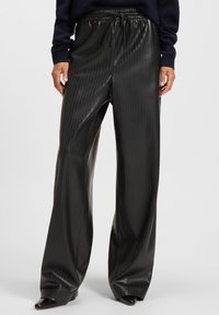 Black faux leather wide-leg pants with vertical pinstripes, elastic waistband with drawstring, and smooth, shiny texture.