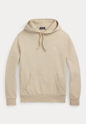 Beige hoodie i mjukt tyg, med en framficka i kängurustil, dragsko i huvan och en liten broderad logotyp på bröstet.