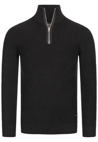 Pull en tricot noir avec un col zippé, présentant un design en côte texturé et des manches longues. Style minimaliste sans motifs supplémentaires.