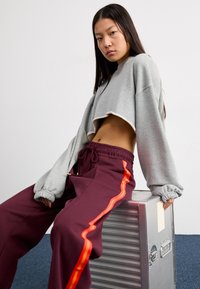 Nike Sportswear PANT - Treningo apatinė dalis - burgundy crush/bright crimson/dark pony