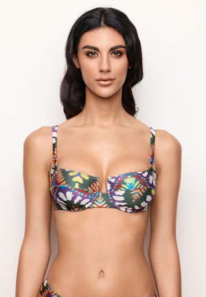 Haut de bikini multicolore avec des motifs floraux et géométriques. Fabriqué en tissu côtelé, il dispose de bretelles réglables et d'une conception structurée.