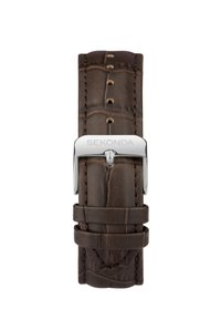 Bracelet de montre en cuir marron avec un motif crocodile, fermoir en métal argenté arborant le nom de la marque "Sekonda", et trous espacés de manière uniforme pour le réglage.