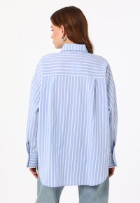 Modanisa BENIN niebieski