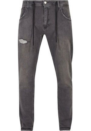 Schmal geschnittene graue Denim-Jeans mit Zugbandbund, distressed Detail am linken Knie, fünf Taschen und kontrastierenden Nähten.