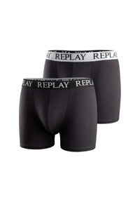 Boxers de algodón negros con un ajuste ceñido, que presentan una cinturilla de logo en blanco y negro en contraste. Se exhiben dos pares.