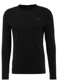 T-shirt noir à manches longues en coton. Il présente un col rond et un petit logo triangulaire sur la poitrine gauche, avec une texture lisse.