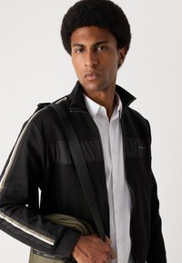 Antony Morato REGULAR FIT IN INTERLOCK BLEND WITH EFFECT LOGO PRINT - Sweater met rits - black
