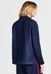 Calliope Poloshirt - blu denim scuro