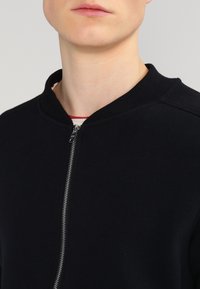 Jack & Jones JCOPETE  - Sudadera con cremallera - black