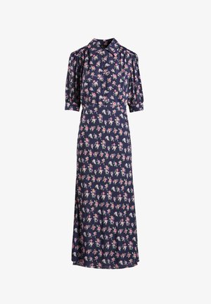 Robe florale marine avec des manches courtes bouffantes, un col pointu et un corsage ajusté avec une jupe fluide. Petit motif de fleurs roses et blanches.