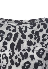 Gray short-sleeve top featuring a black and gray leopard print, rounded neckline, and a patch pocket detail on the front.