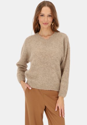 - Sweter