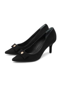 Black suede pointed-toe high heels with a small bow and gold button detail on the front, shown side by side on a white background.