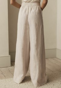 Next PREMIUM WIDE LEG - Hlače - natural