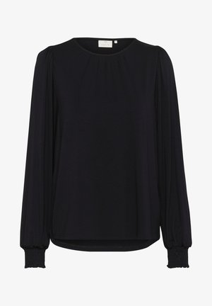 Must have mustamustöösärk, millel on ümar kaelus ja r gathered shoulders. Omab elastseid mansette ja lõdva istuvusega. Sile tekstuur.