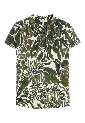 Blusa corta a maniche corte verde e beige con un taglio rilassato, scollo a V e un motivo di foglie astratte su sfondo crema.