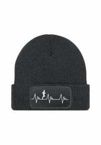 Black knit beanie with a folded cuff, featuring a rectangular label showing a running figure and heartbeat line in white.