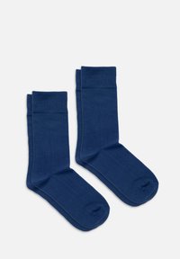 Marineblau Socken aus weicher Baumwolle. Klassisches Crew-Design mit gerippten Bündchen und glatter Textur. Keine sichtbaren Muster oder Akzente.