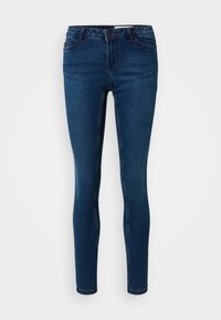 Jeans skinny in denim blu scuro, con chiusura a bottone, passanti per cintura e tasche frontali. Texture liscia con una leggera elasticità.