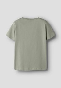 T-shirt med kort ärm och rund halsringning i ljusgrön färg, tillverkad av en mjuk bomullsblandning med slät yta och normal passform.