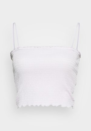 Crop top de culoare mov deschis, cu detalii smock și bretele subțiri, având un decolteu cu volane, cu o suprafață texturată.