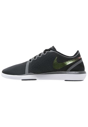 Black athletic shoes featuring a textured upper, grey accents, and a green reflective Nike logo, with a white sole labeled "LUNARLON."