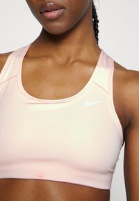 Nike Performance BRA - Sutiã desportivo de suporte médio - atmosphere/white