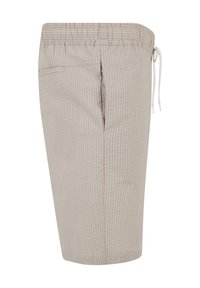 Short beige en seersucker avec une taille élastique et un cordon blanc, avec des poches latérales et arrière.