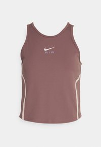 Débardeur de sport mauve sans manches avec des rayures latérales beige clair et un logo blanc Nike Swoosh ainsi que le logo "AIR" au centre avant.