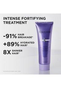 Kérastase Blond Absolu Cicaflash tube, 250 ml, blank lilla plast, med tydelig produktinformasjon og fordeler.