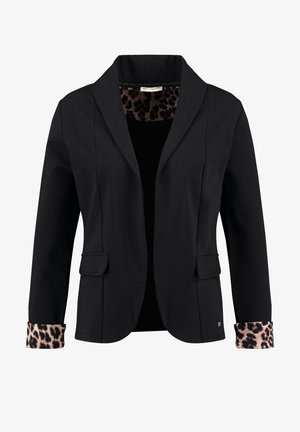 Blazer nero su misura con rivestimento in stampa leopardata visibile sui polsini ripiegati e all'interno del colletto, caratterizzato da tasche a pattina sul davanti.