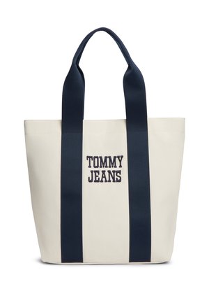 Beige Segeltuchtasche mit zwei breiten, marineblauen Trägern und "TOMMY JEANS" in Marineblau auf der Vorderseite mittig gestickt.