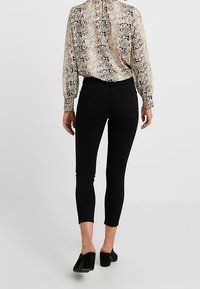 Topshop Petite Vaqueros pitillo - black