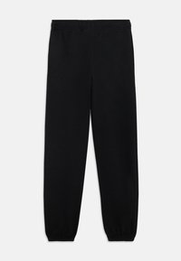Svarte joggebukser laget av myk strikket stoff, med elastisk midjebånd og smale mansjetter ved anklene. Ingen lommer er synlige.